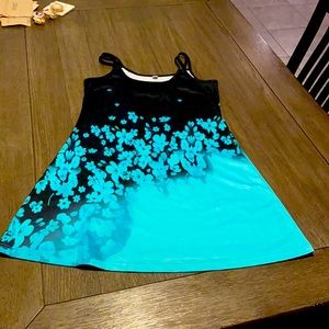 Stylish print sleeveless mini. Tropical flower print in a vibrant blue